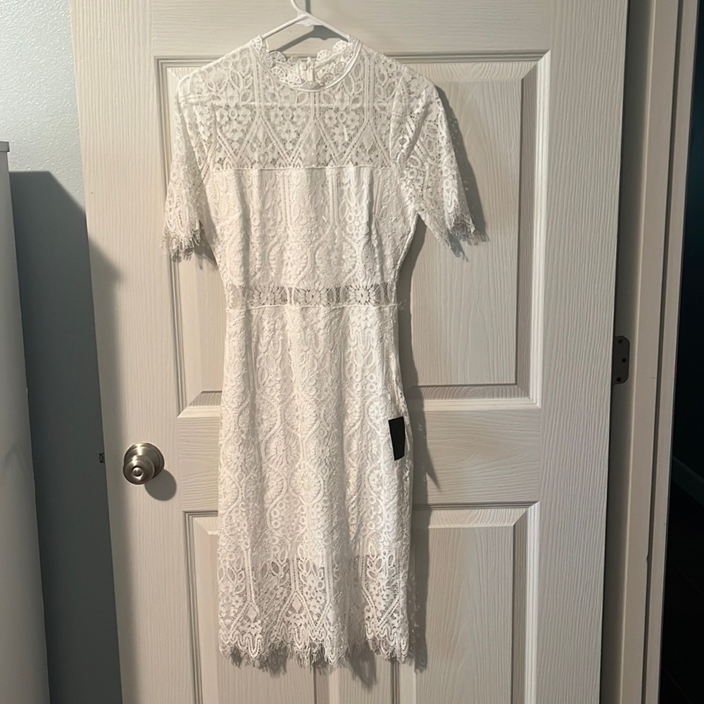Lulus white lace tea length dress. New with tags. Size s.